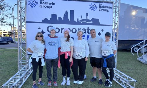 A group portrait of Amports team wearing a sport attire